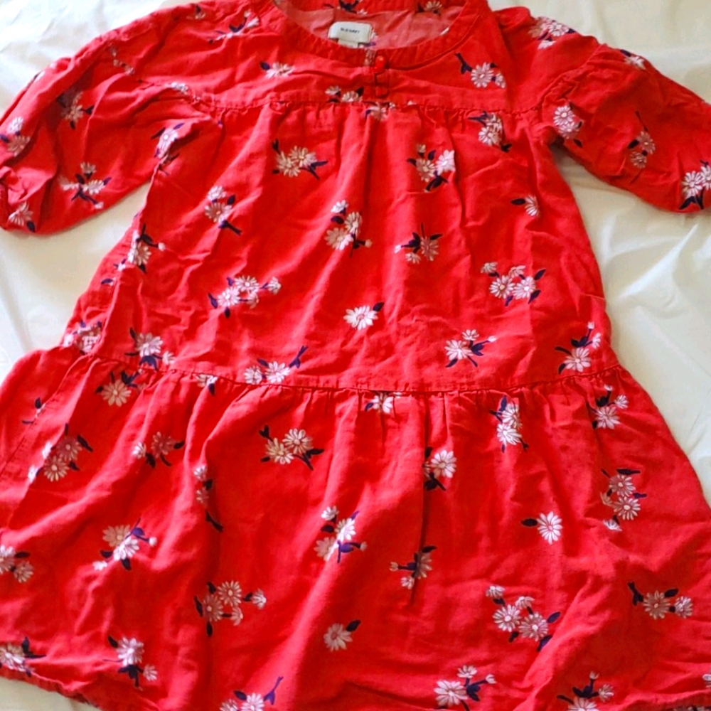 Red floral day dress with cinched elbows